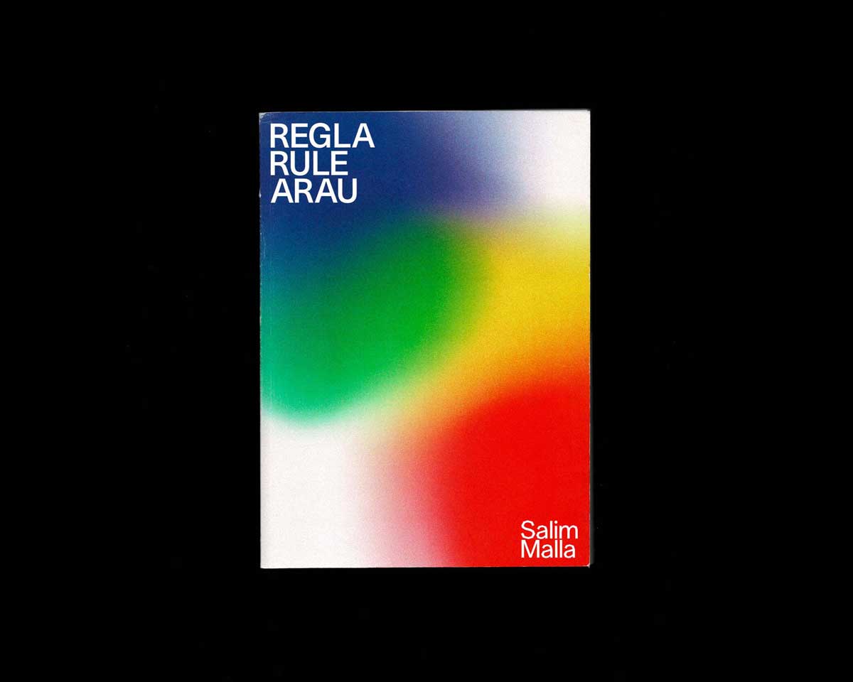 Escaneo de la portada de Regla/Rule/Arau donde se representa el espectro visible.